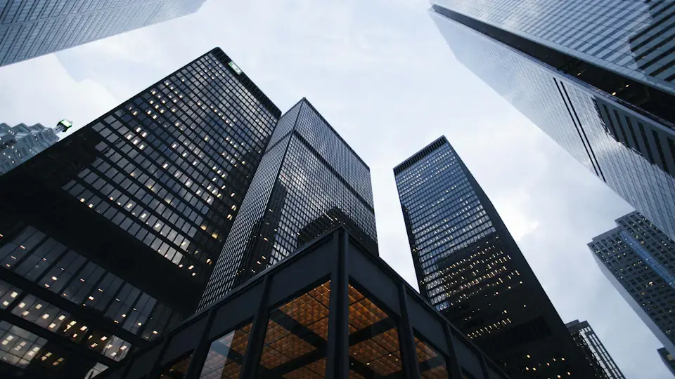 A corporate tower seen from below